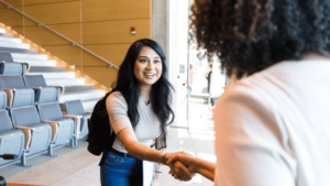 A student introducing herself to her college professor