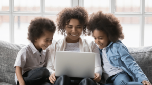 A mom watching science videos on YouTube with her kids