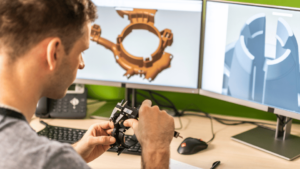 3D Modeller designing a product using digital software