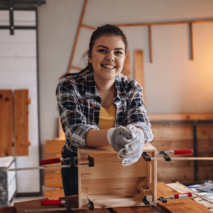 A woman in a carpentry lab